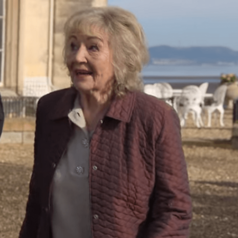 A Castle for Christmas Tina Gary Rustec Maroon Jacket